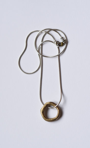 Raw Brass Circle on Silver Snake Chain